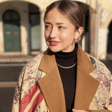 woman wearing luxury cashmere and silk shawl in Berica Breeze design