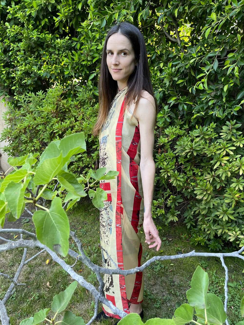 woman wearing table air oversize wrap as halter style dress