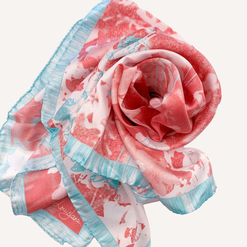 Fresh Beauty silk twill large square scarf in coral and teal colour, coiled