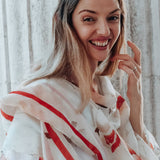 woman wearing oversized square scarf camelia cream 